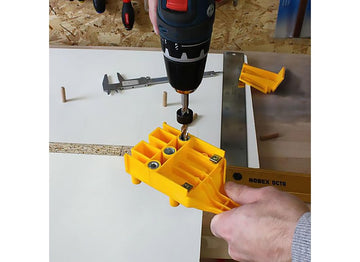 Wolfcraft Dowel Quick Doweling Jig hardened bushings guide holes smoothly.