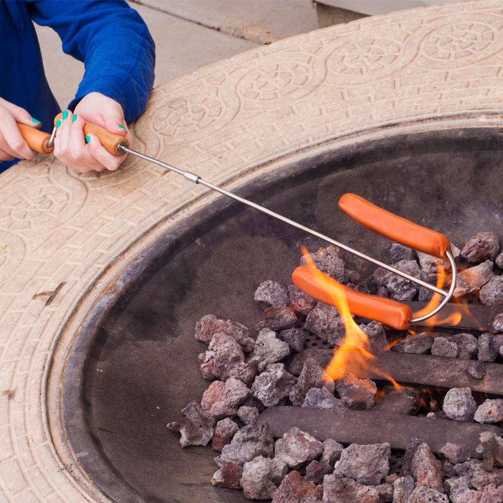 Wolf'em stainless steel safe roasting fork keeps hot dogs out of coals