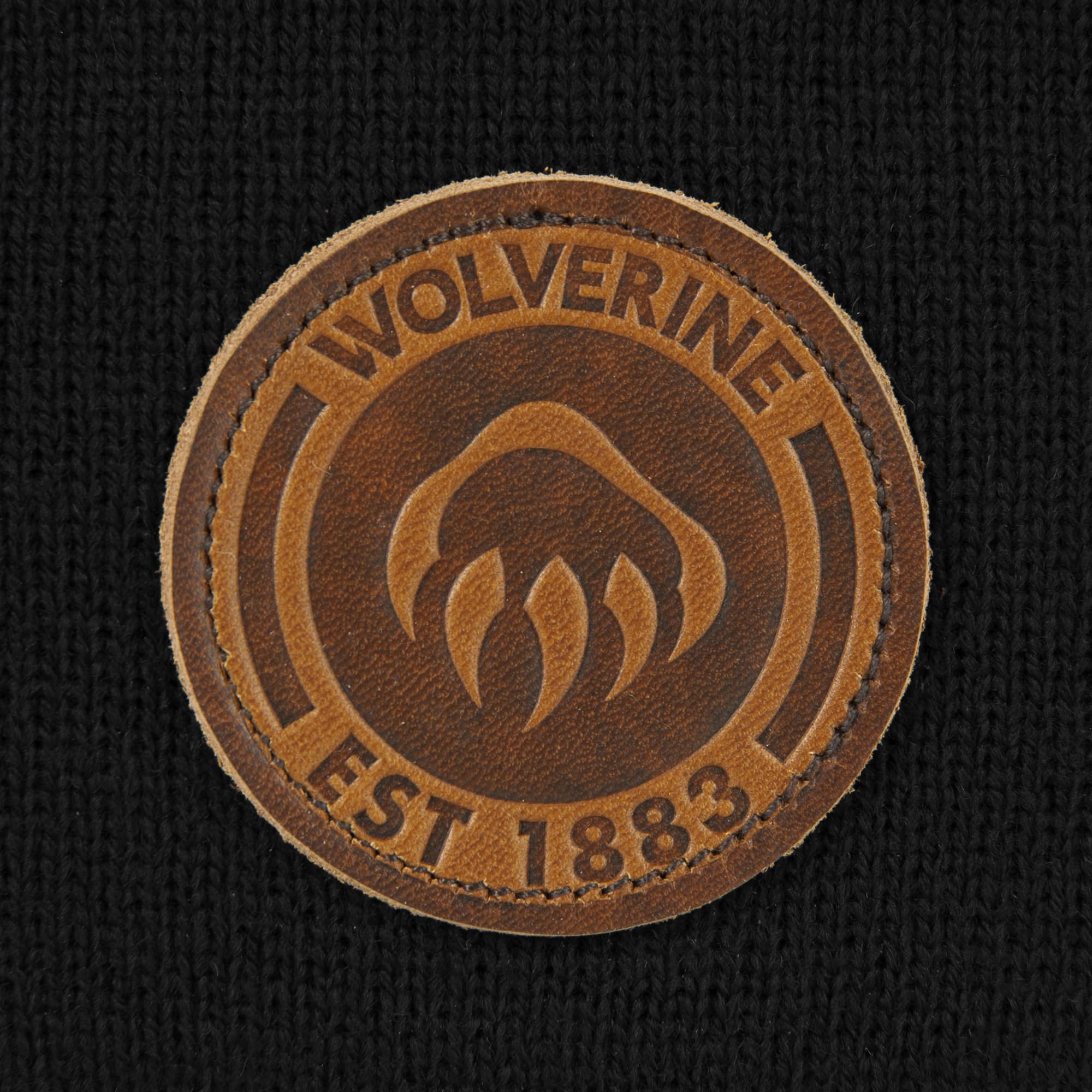 Wolverine circle logo leather detail on cuff
