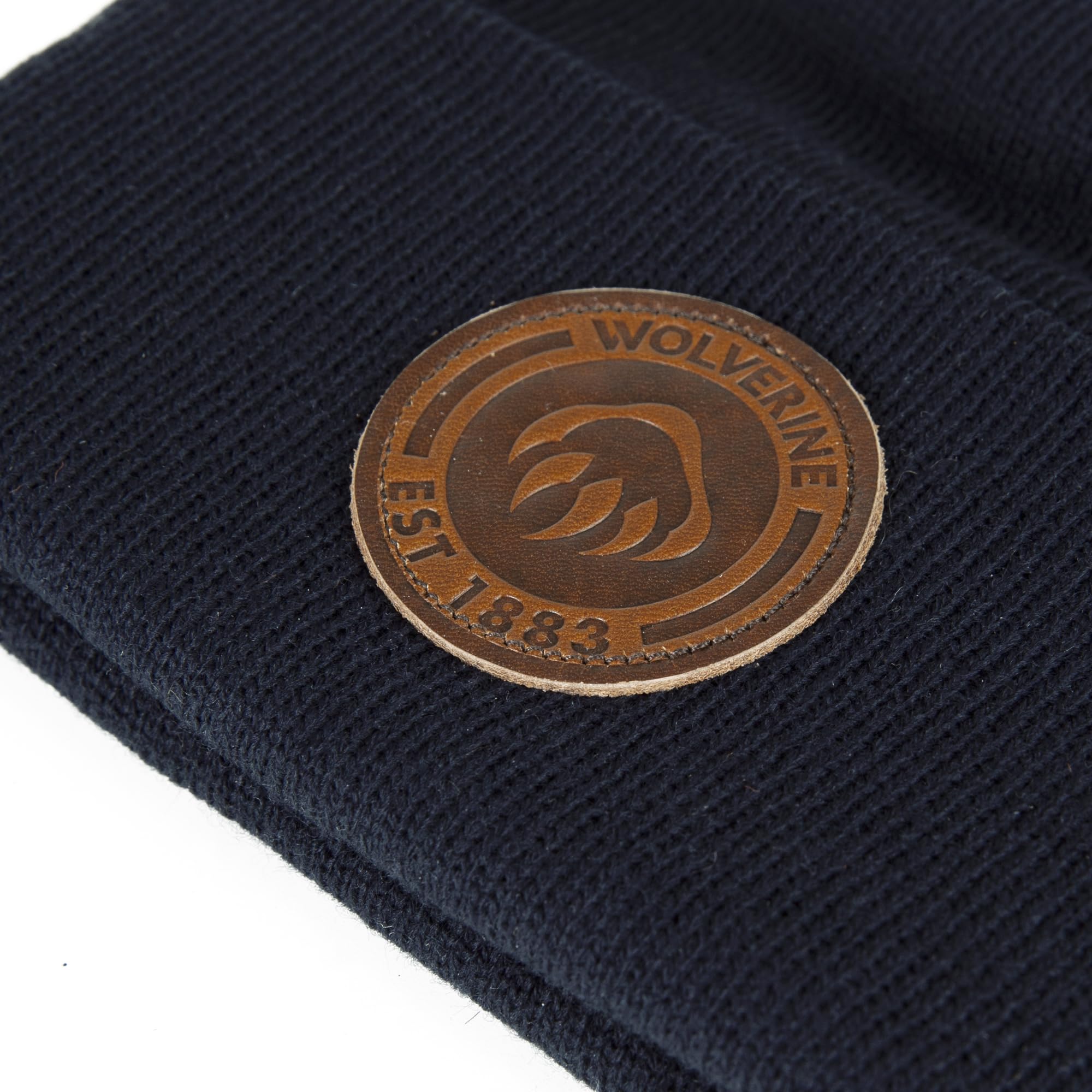 Wolverine knit cap showing stretchy acrylic fabric and texture.