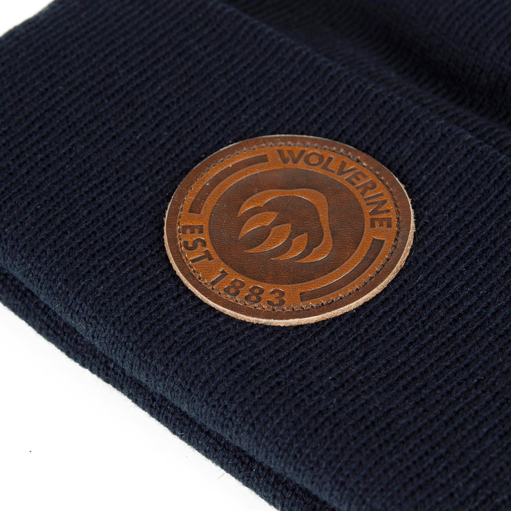 Wolverine knit cap showing stretchy acrylic fabric and texture.