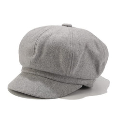 Light gray women's beret newsboy hat worn by model