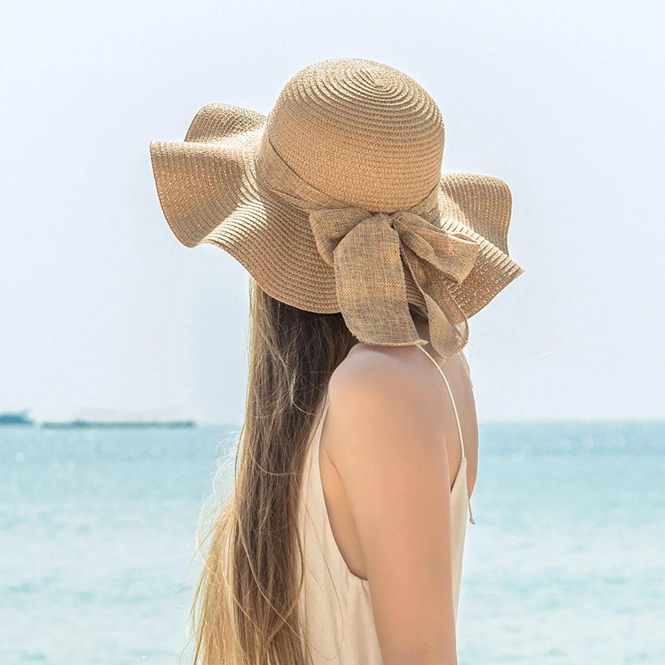 Ribbon bow detail on khaki floppy sun hat