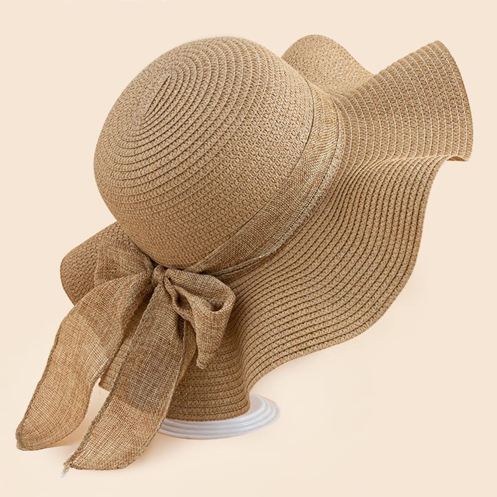 Lifestyle shot of khaki floppy sun hat at the beach