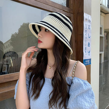 Beach-ready white sun hat with breathable straw material