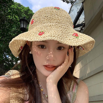 Wide brim sun hat providing face shade and sun protection