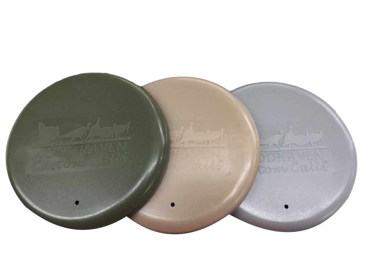 WoodHaven Surface Saver lid trio with beige, gray, and camo green for easy identification and surface protection.