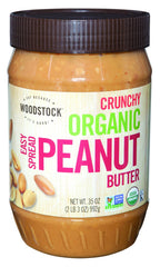 Woodstock Farms Organic Peanut Butter Crunchy Salted 35oz jar—great for spreading on toast and breakfast bowls.