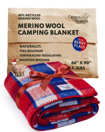 Woolly Mammoth Woolen Company wool blanket Berry Plaid folded for compact warmth on trips.