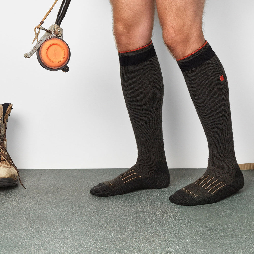 WORN merino hunting socks in-boot setup demonstrates secure under-boot wear