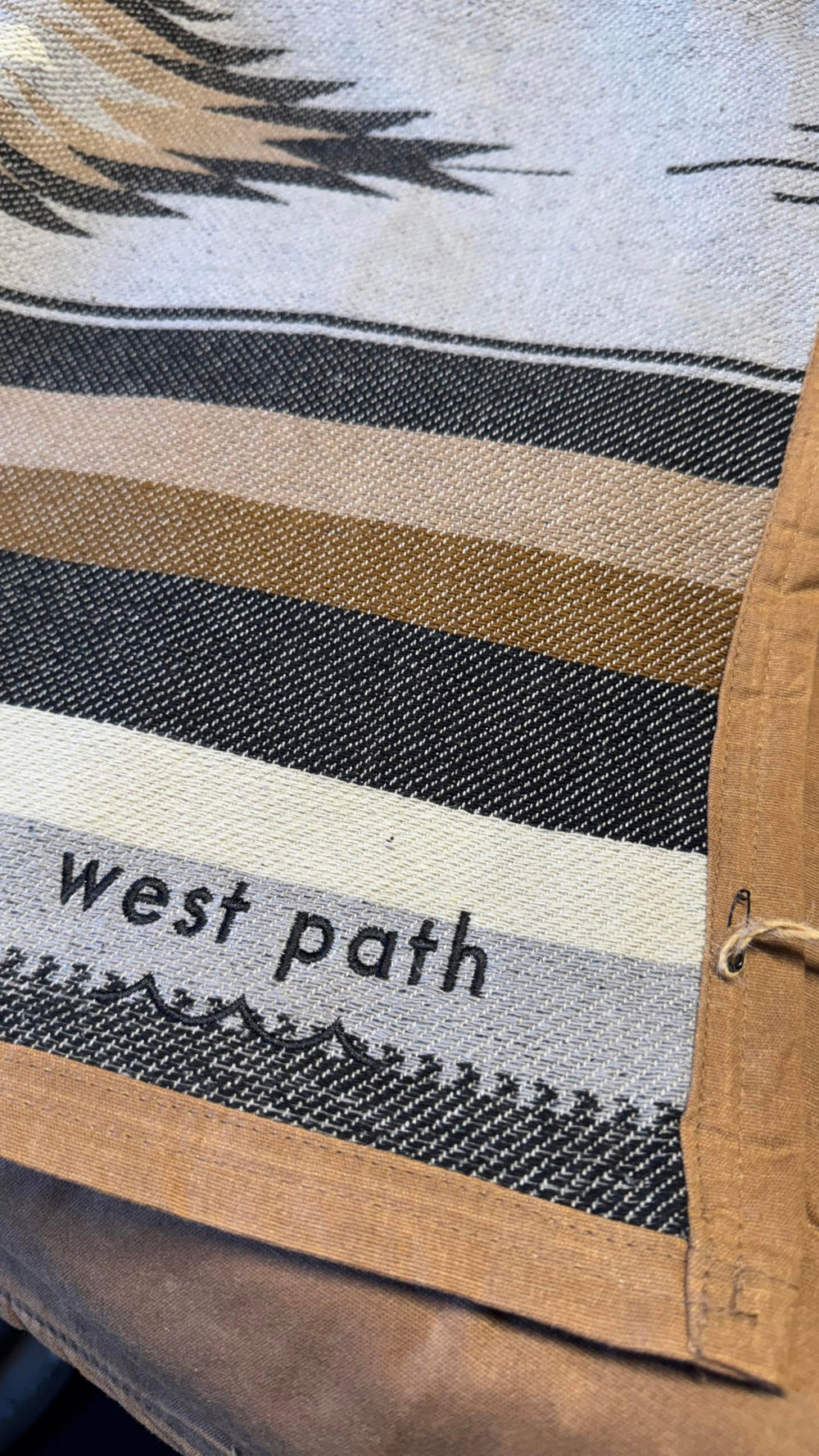WP West Path Canvas Camp Blanket doubles as bushcraft bedroll outdoors.