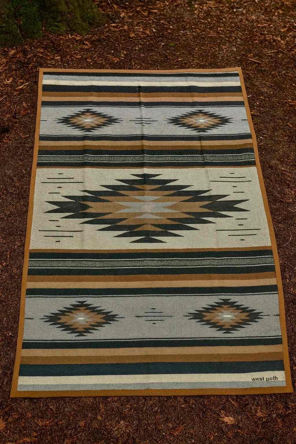 WP West Path Canvas Camp Blanket for festivals or concerts on grass.