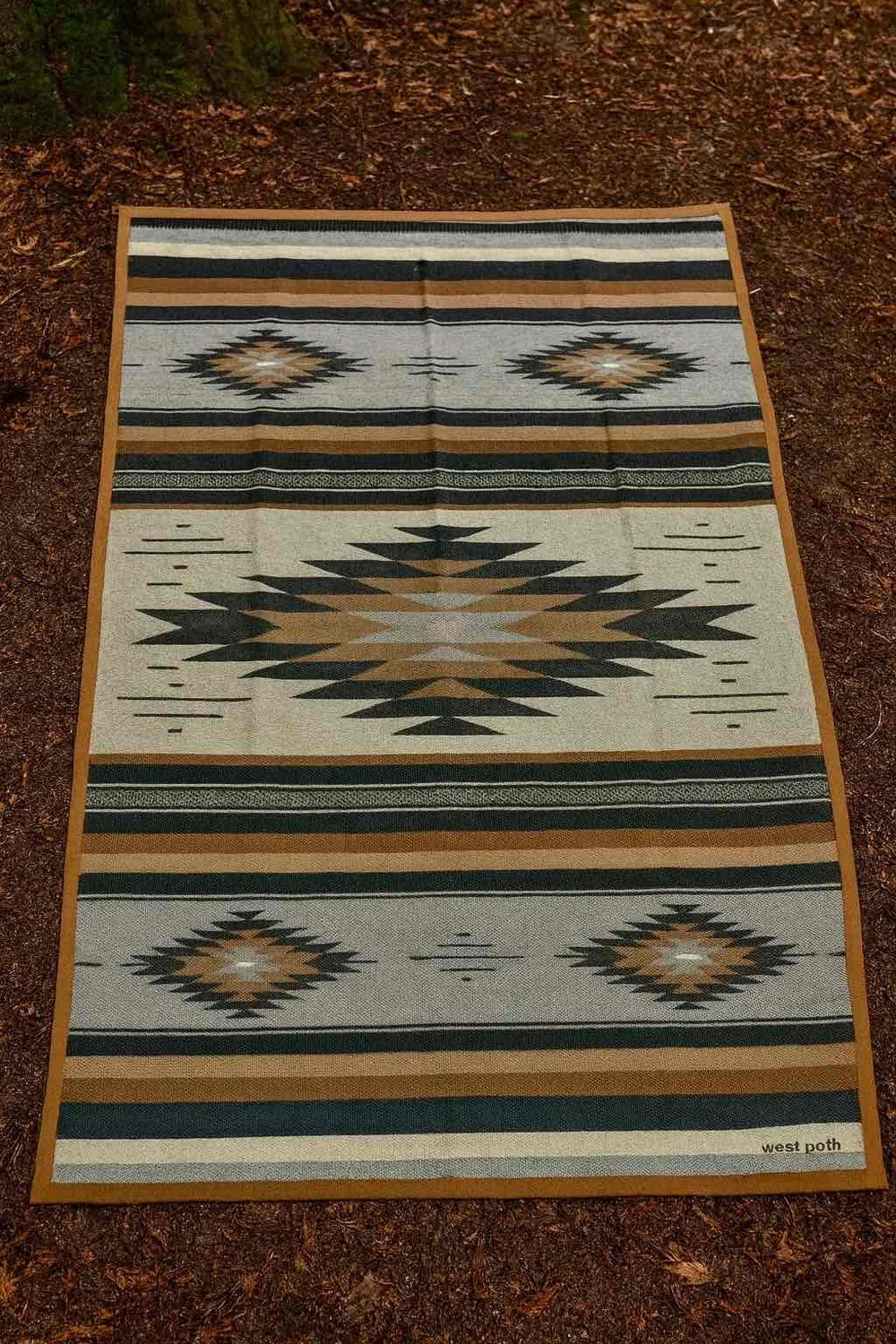 WP West Path Canvas Camp Blanket for festivals or concerts on grass.