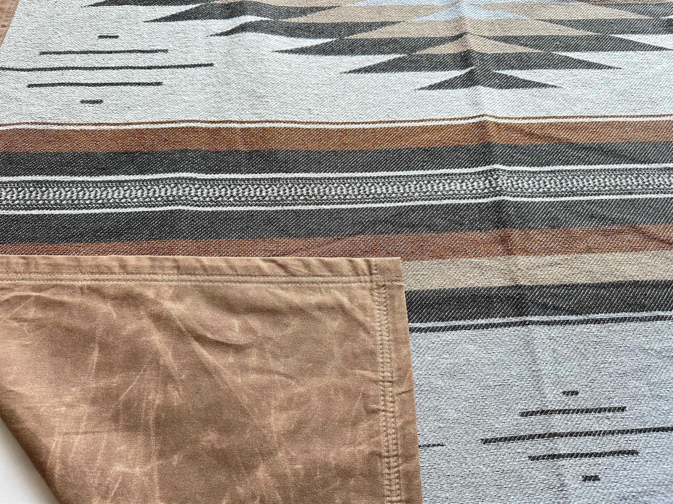 WP West Path Canvas Camp Blanket with waterproof back for dry, outdoors-ready comfort.