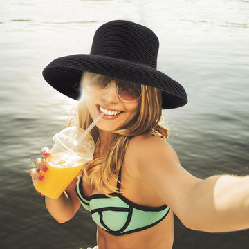 Khaki straw hat styling on model