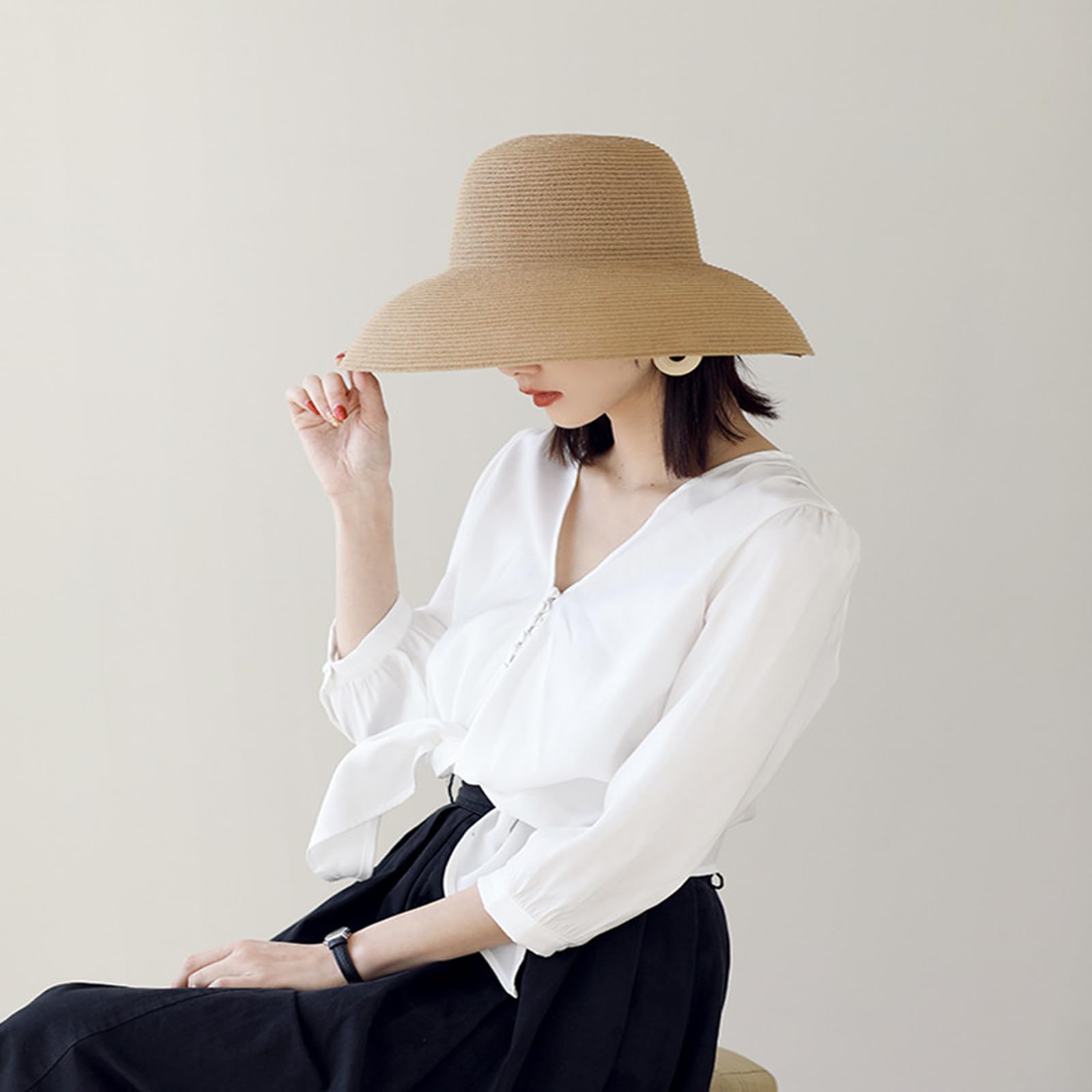 WUODHTW packable-foldable straw sun hat folds neatly for travel.