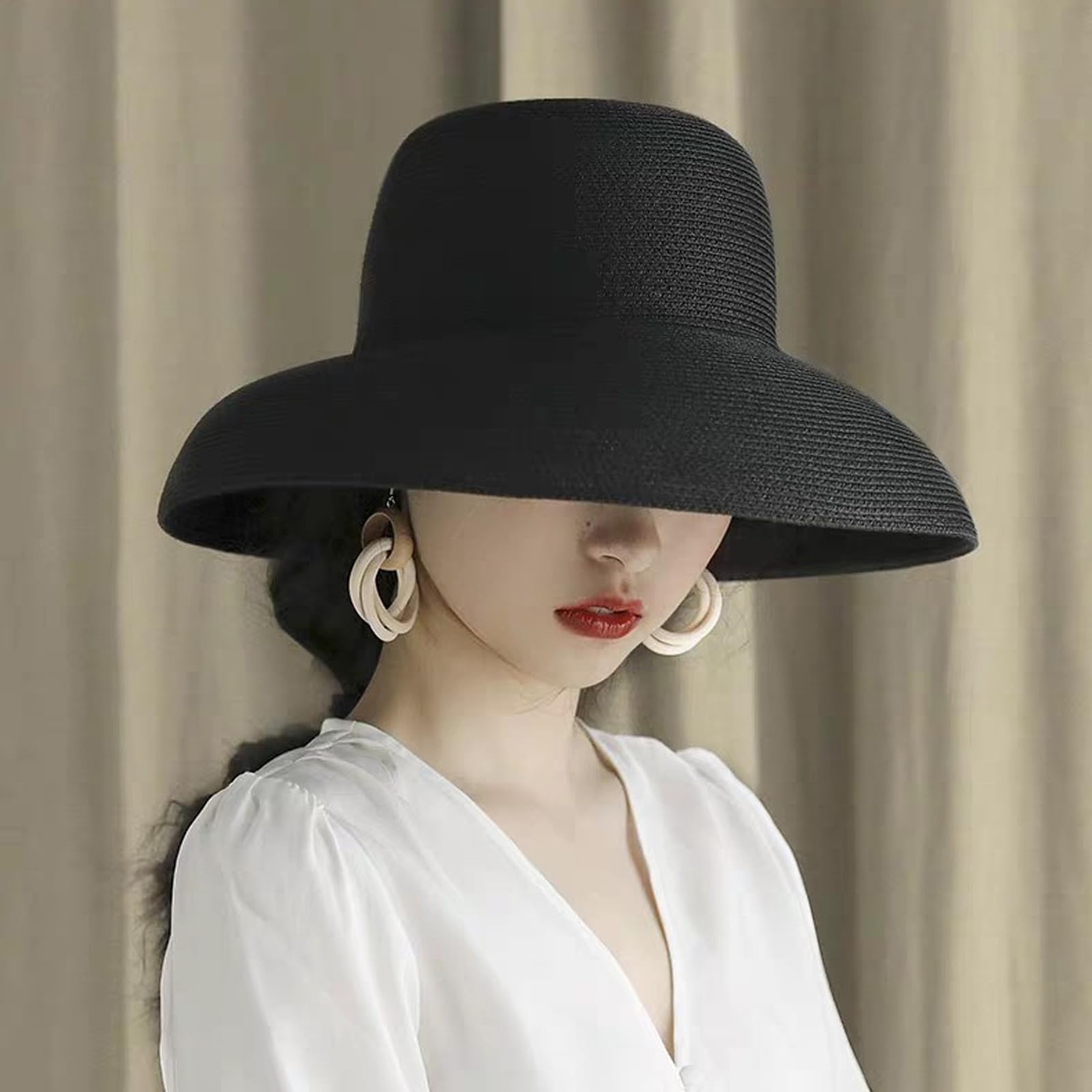 WUODHTW hat features a chin drawstring for secure fit in windy conditions.