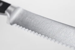 Wüsthof Classic 6-inch Utility Knife full-tang for balanced control.