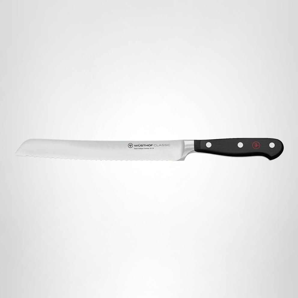 Wüsthof Classic 8-Inch bread knife on counter ready for kitchen prep.
