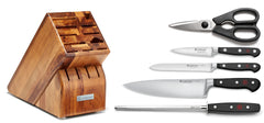 WÜSTHOF Classic paring knife 3.5 inches in focus for precision slicing.