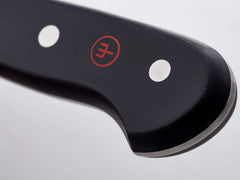 Wüsthof Classic knives in use with beef for clean slices.