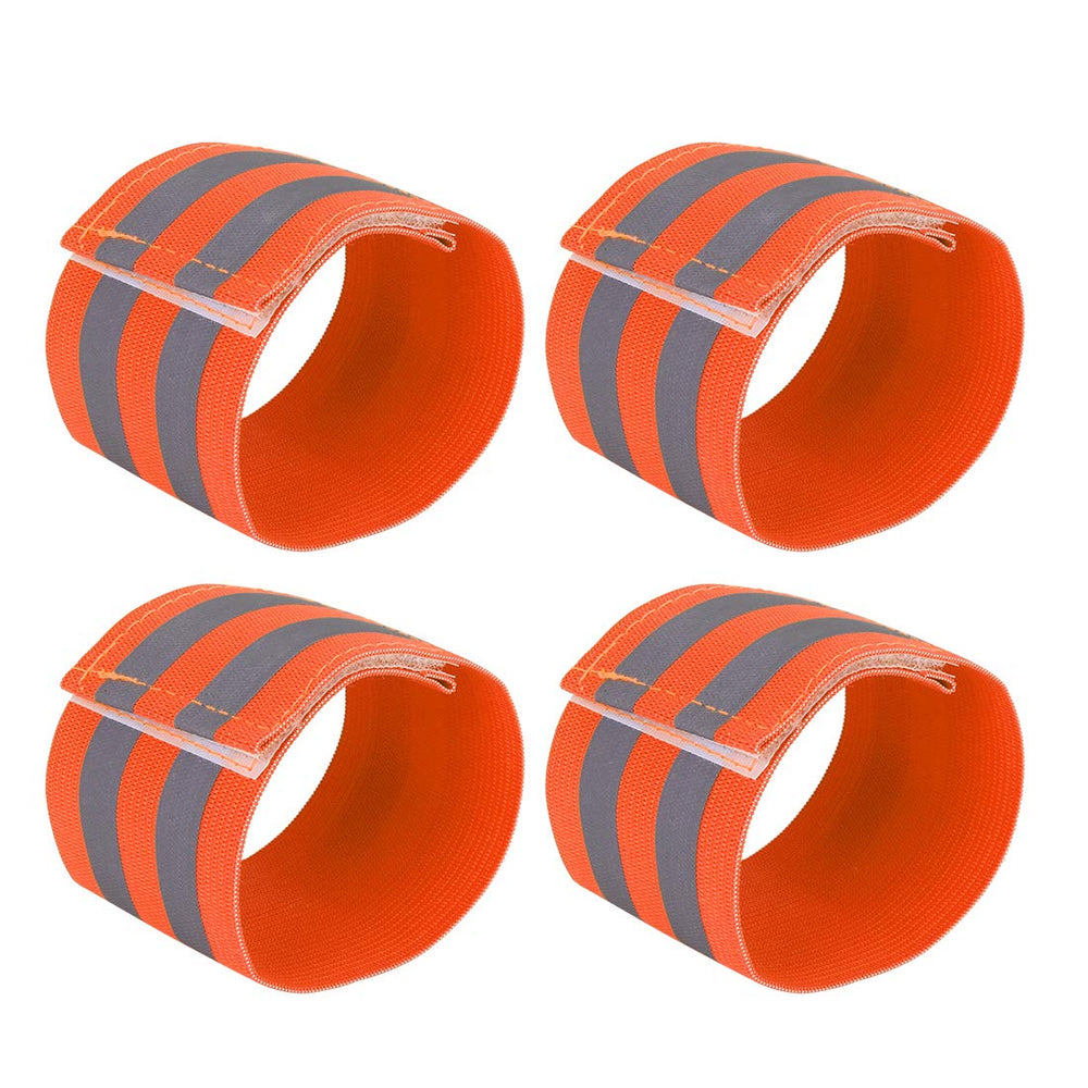X AUTOHAUX orange reflective wristbands on wrist showing bright visibility
