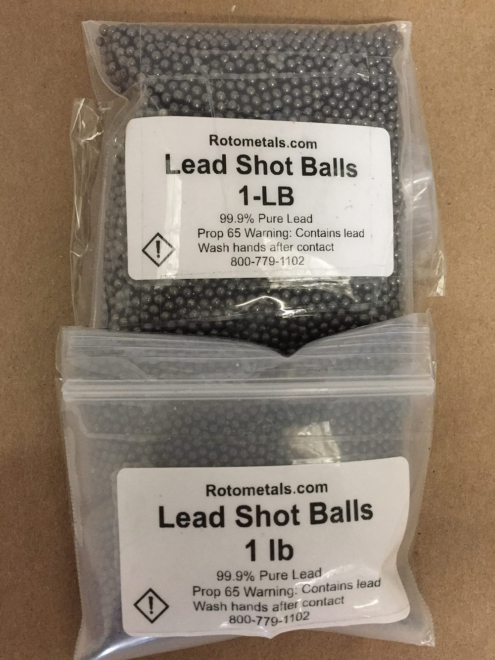 Xnets lead shot balls closeup on metallic surface, uniform rounds.