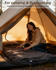 XPLI heated liner connected to USB power bank for camping use