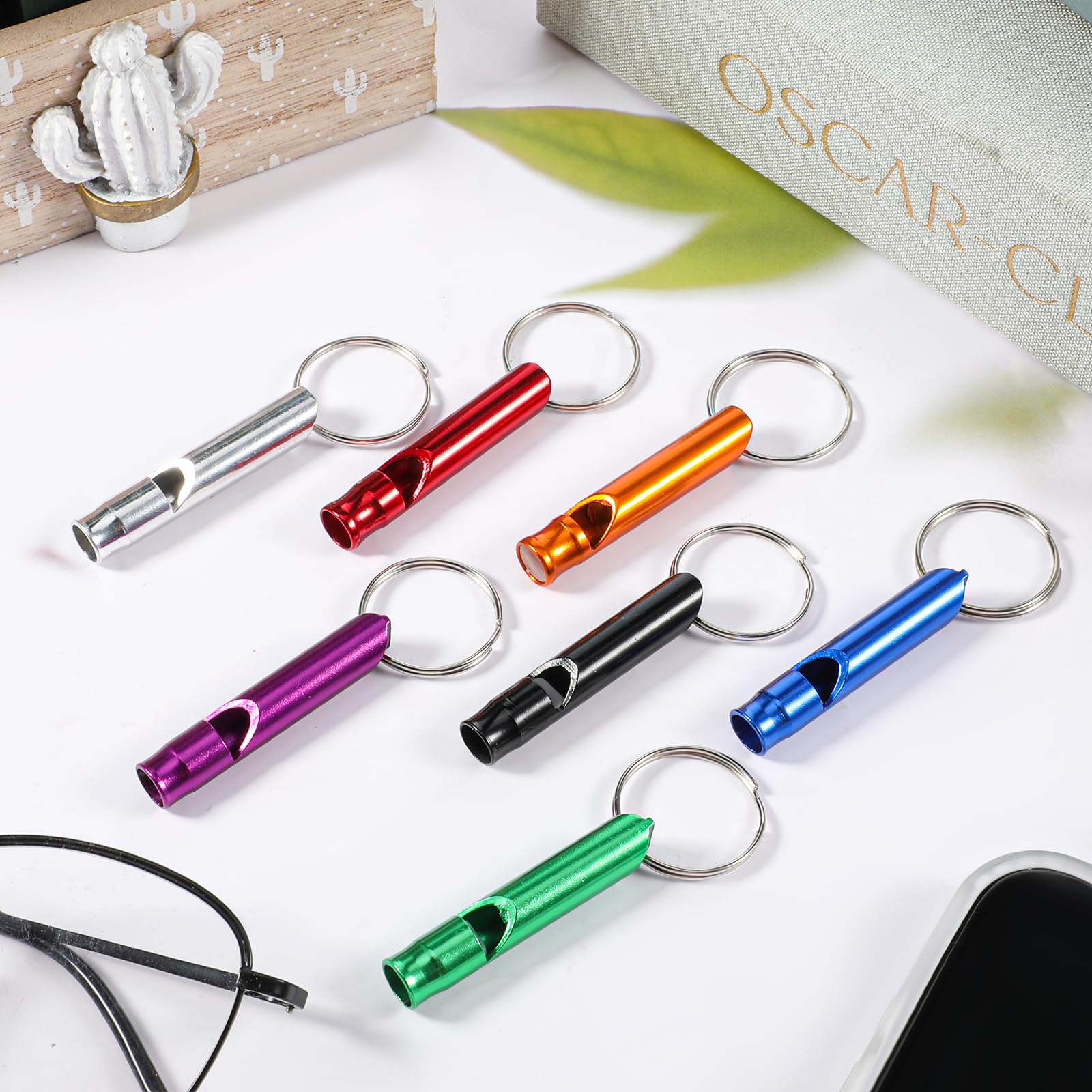 Xyembu emergency whistle in mixed seven colors for group sharing.