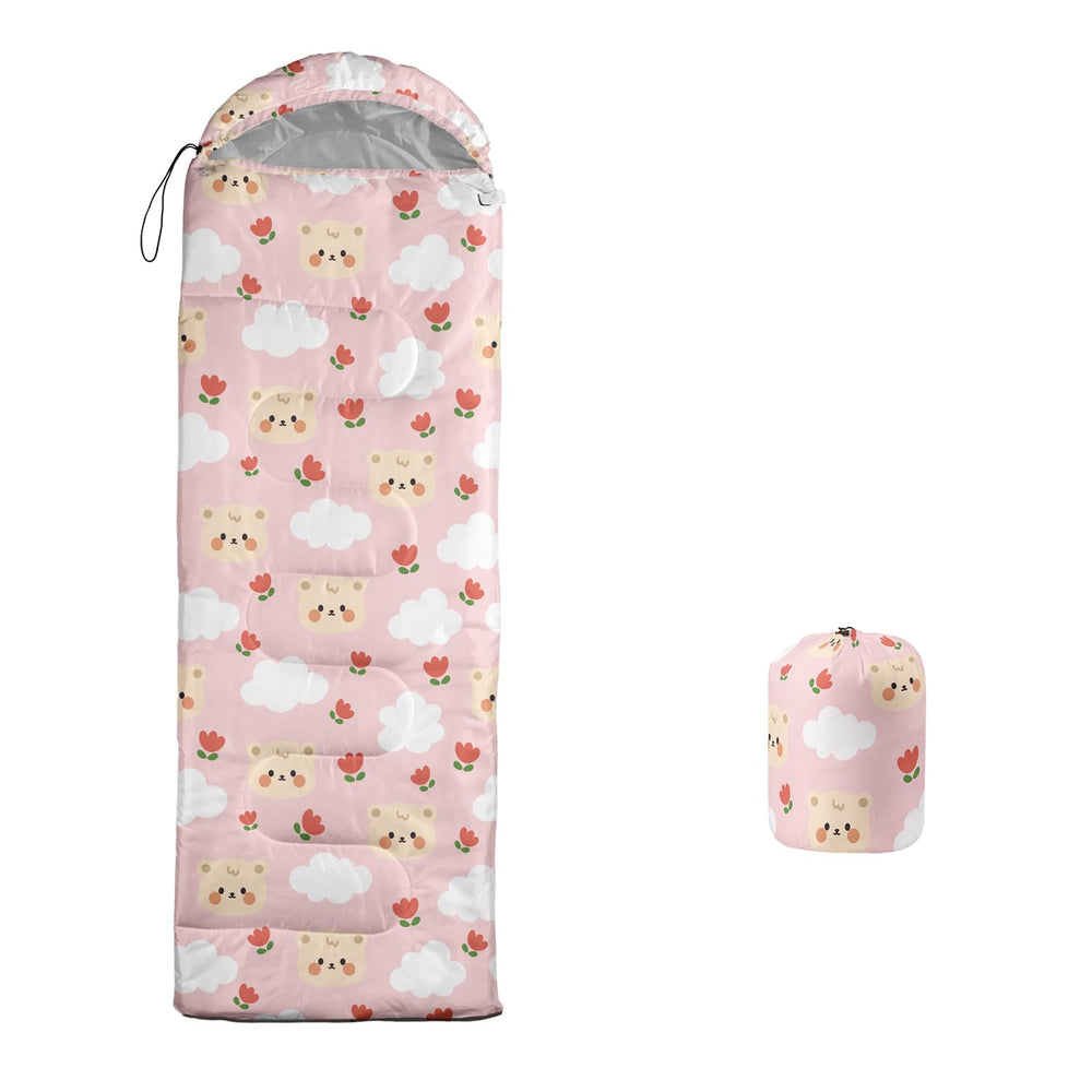 XYNHML cartoon bear sleeping bag stored in a compression bag for easy travel.