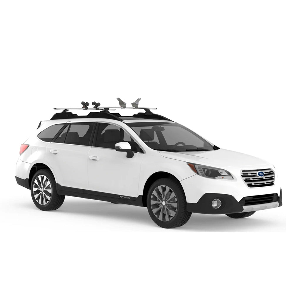Yakima HandRoll heavy-duty strap supports secure transport on road.