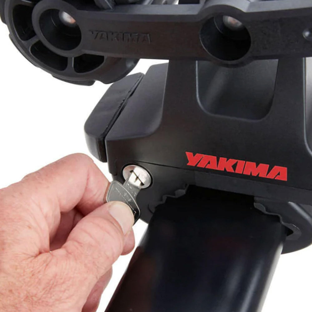 Yakima HandRoll secure-fit on vehicle roof during highway trips.