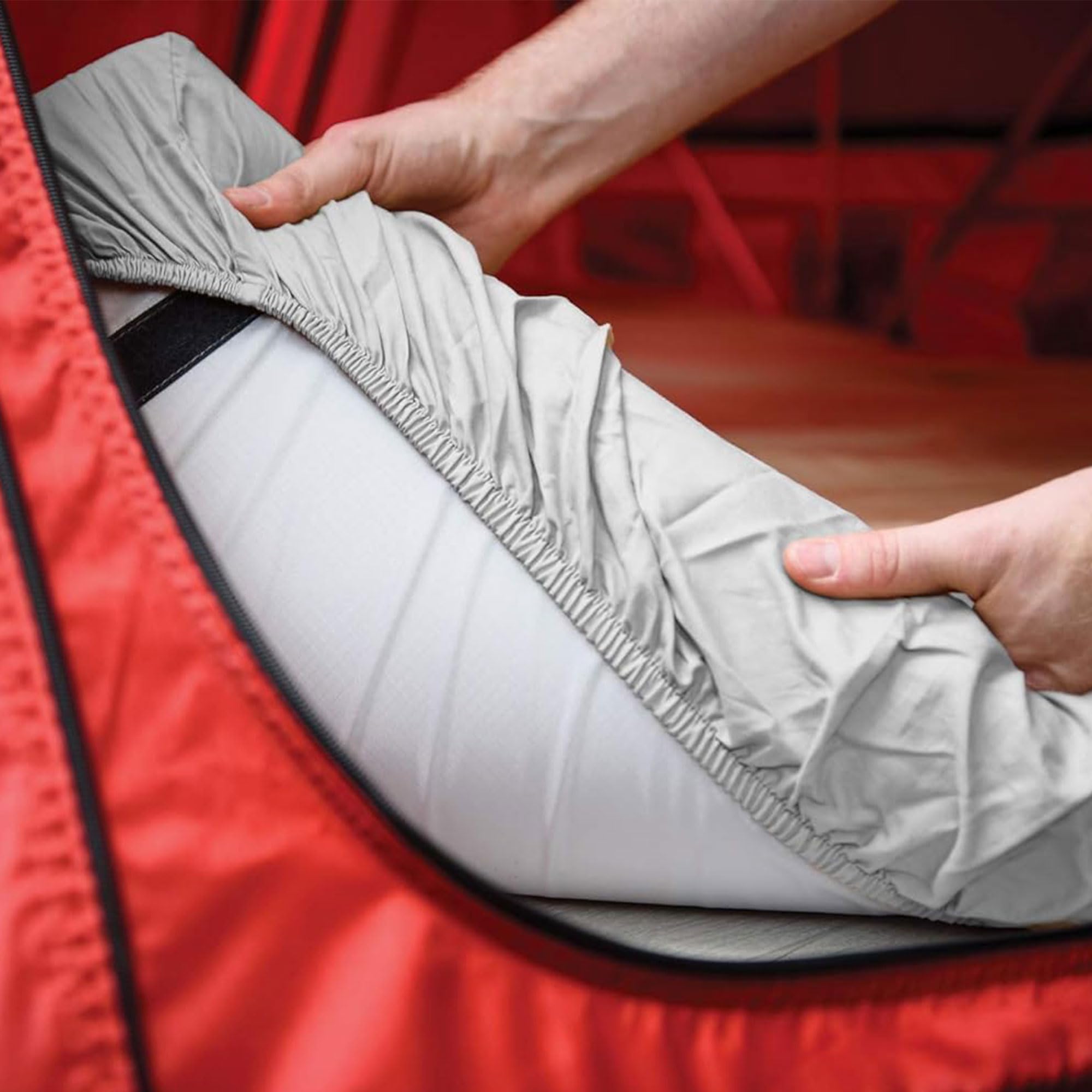 Yakima SkyRise no-tuck demonstration on compact tent mattress.