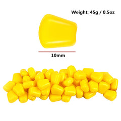 Set of 5 yellow fake corn soft baits floating in water, silicone material