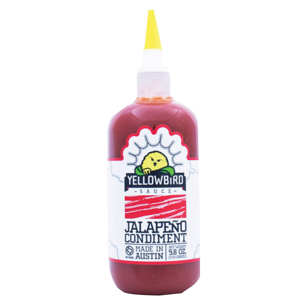 Yellowbird Jalapeno sauce bottle pour adds bright heat to wings and tacos.
