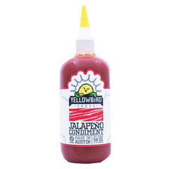 Yellowbird Jalapeno sauce bottle pour adds bright heat to wings and tacos.