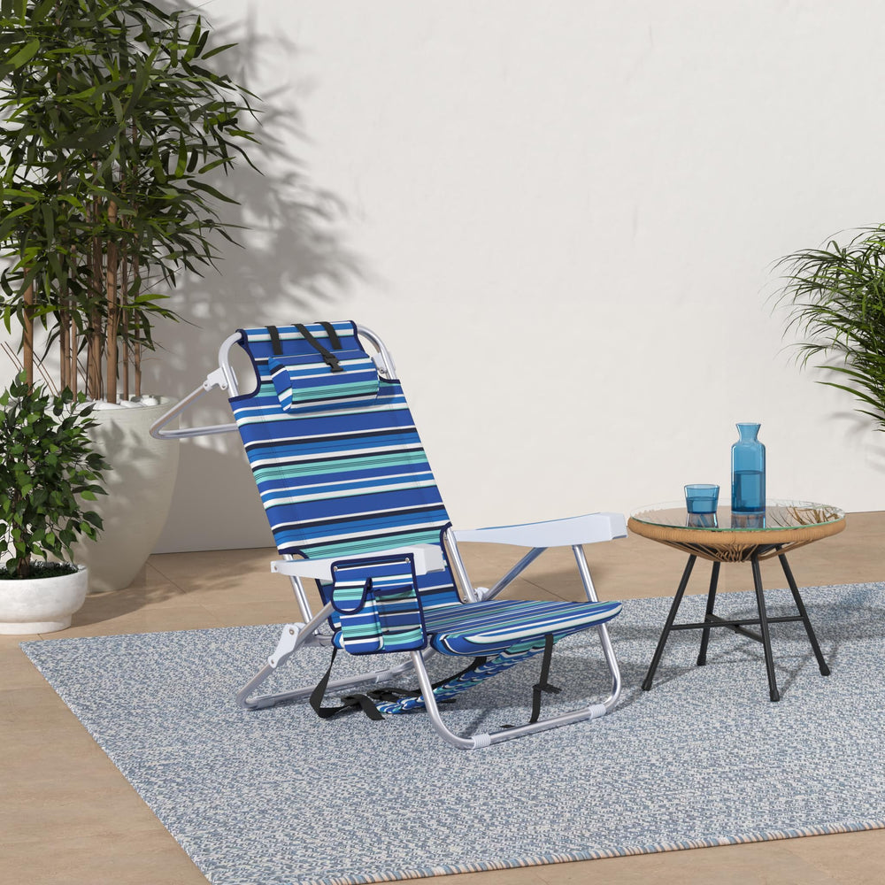 Yestomo beach chair with backpack straps enables hands-free transport for easy beach days