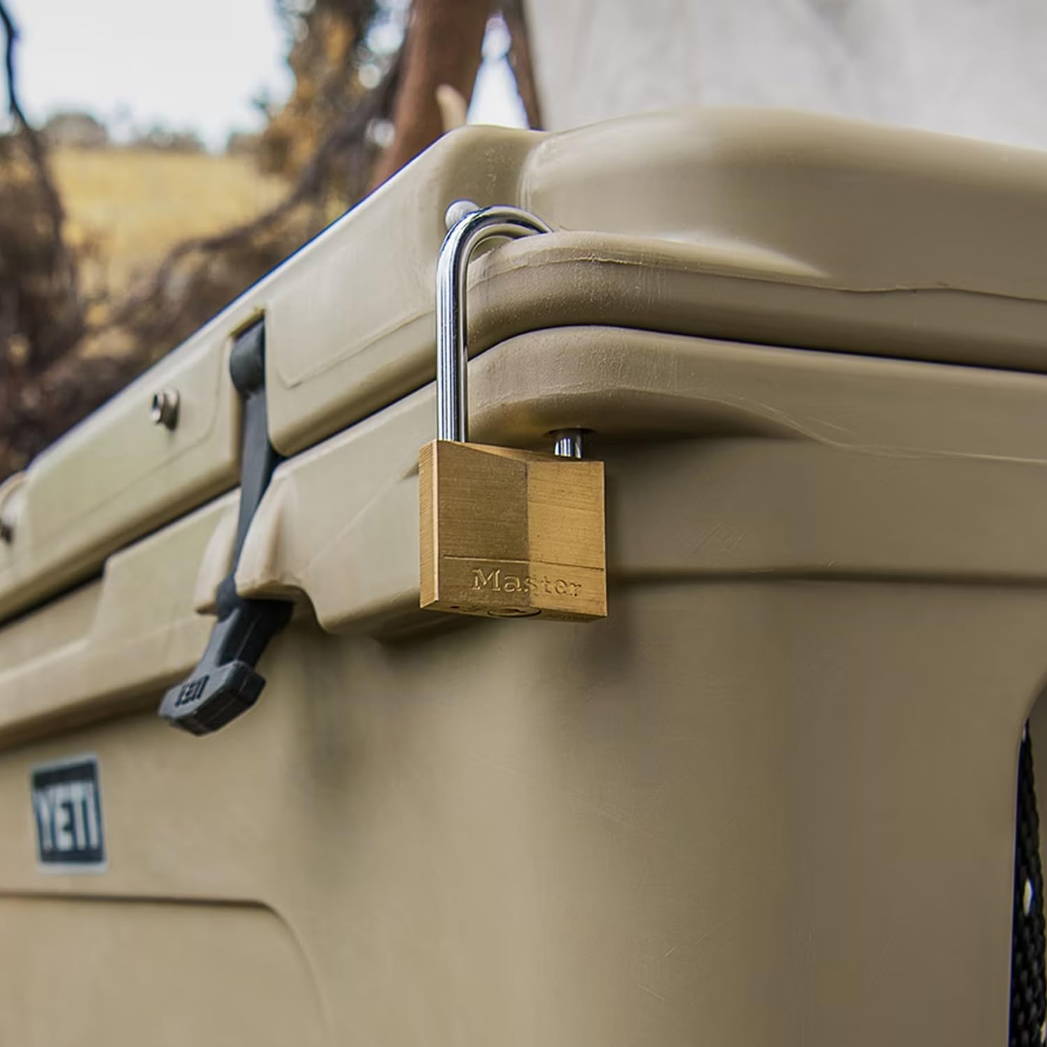 YETI brass padlocks close-up showing durable, weather-ready hardware.