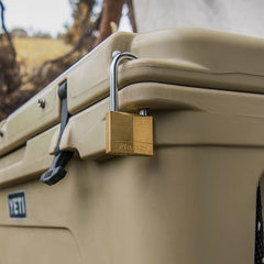 YETI brass padlocks close-up showing durable, weather-ready hardware.