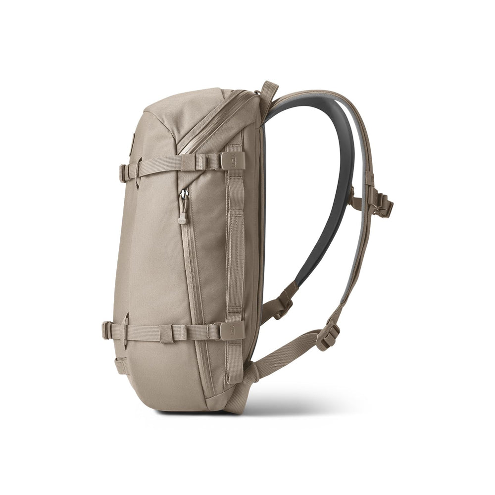 YETI Crossroads 22L SideHustle Pockets enable easy side access.