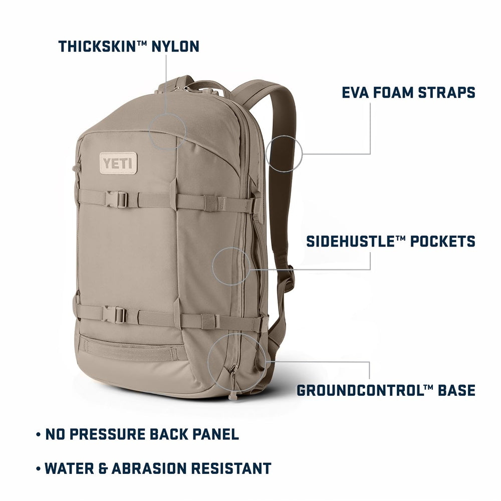 YETI Crossroads Backpack 27L side view with Rambler Bottle pockets enables on-the-go hydration.