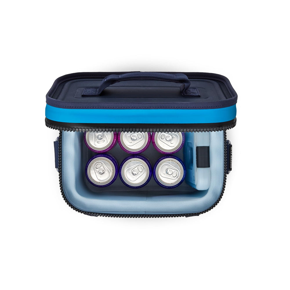YETI Hopper Flip 8 in outdoor use with beverages secured.