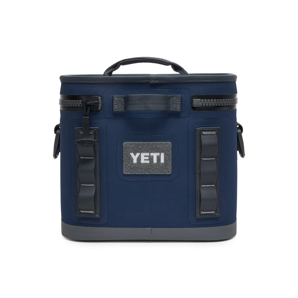 YETI Hopper Flip 8 navy dryhide shell demonstrates waterproof, puncture-resistant protection.