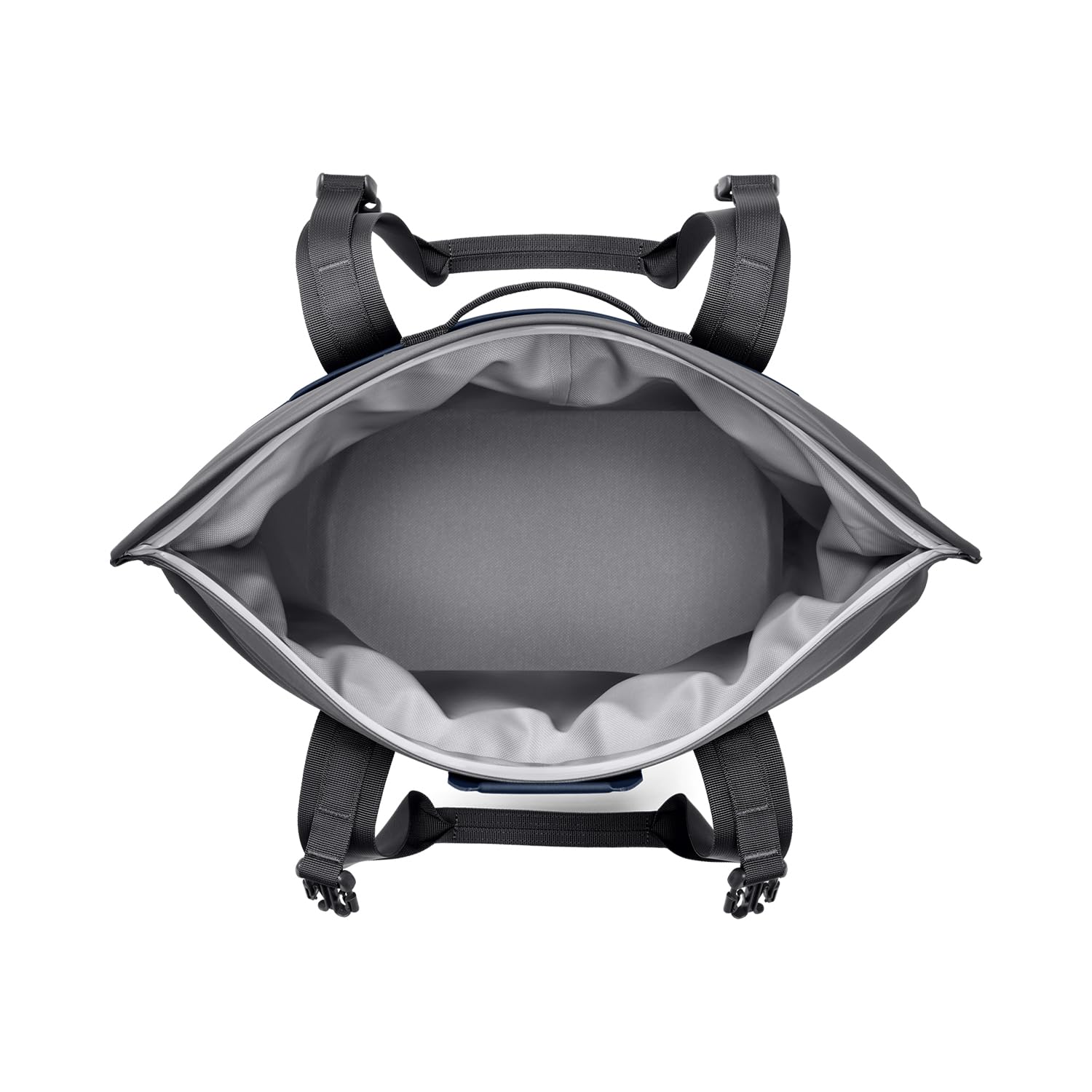 YETI Hopper M15 Navy side view on outdoor surface