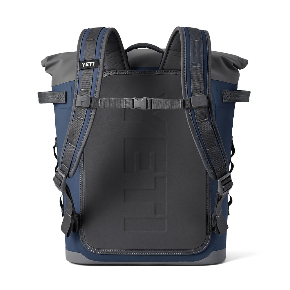 YETI Hopper M20 Navy fabric detail signals rugged, UV-resistant construction.