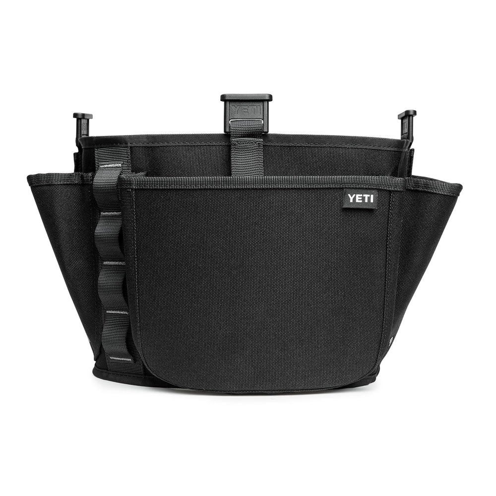 YETI LoadOut belt keeps essentials within reach during outdoor tasks.