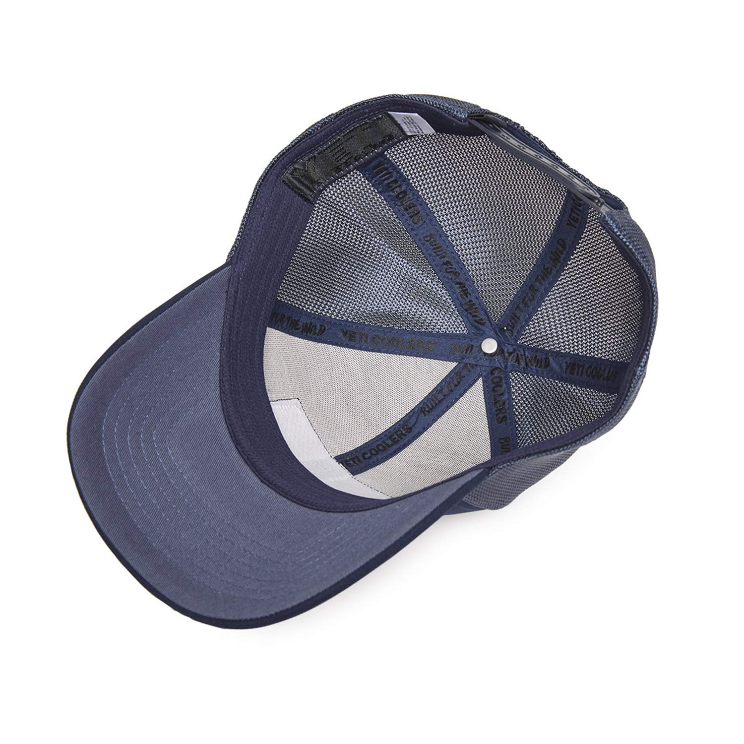 YETI Patch Trucker Hat Navy worn outdoors