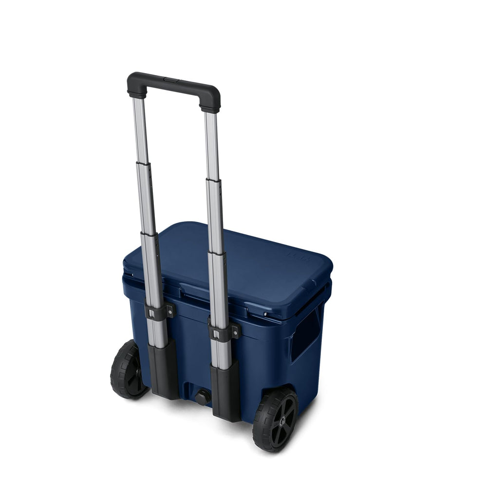 YETI Roadie 32 navy durable shell protects contents during rugged use.