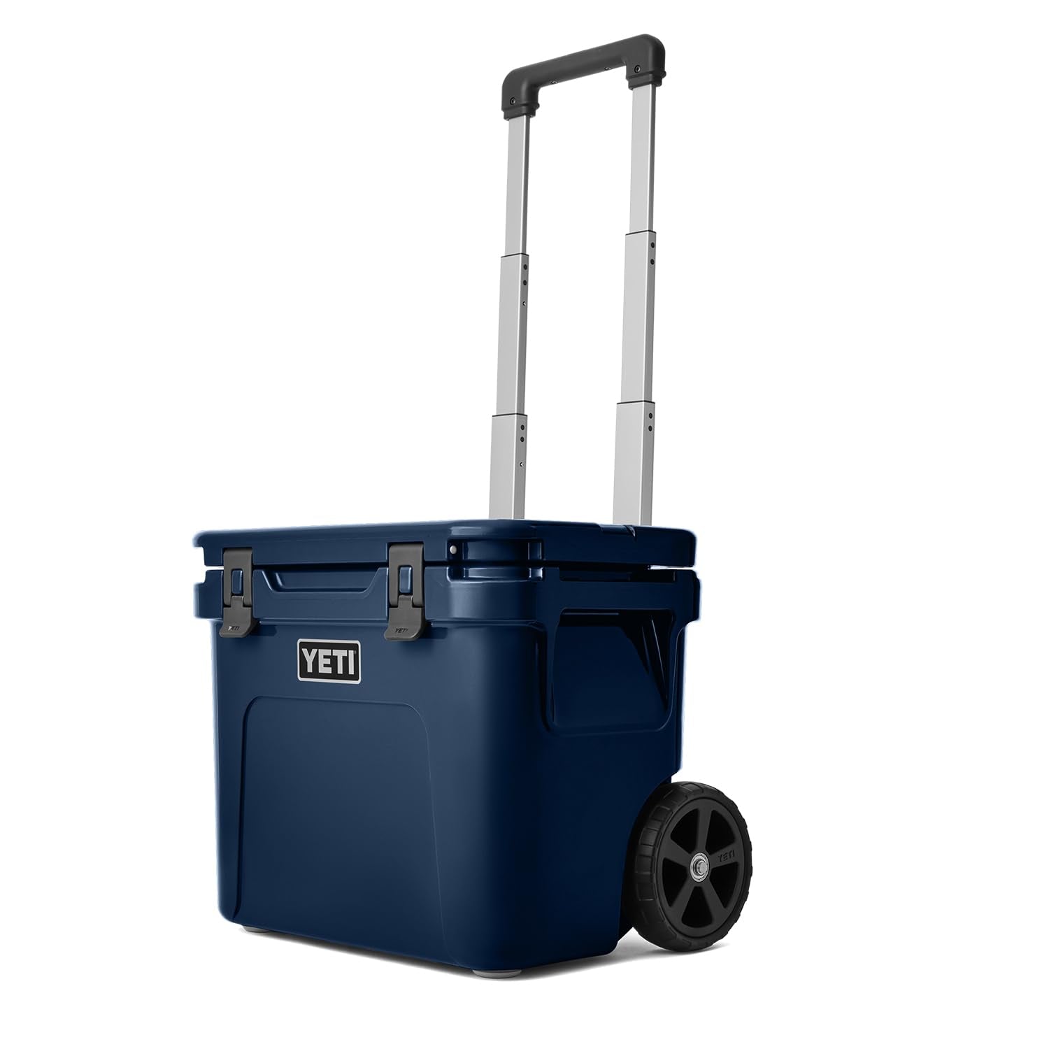 YETI Roadie 32 navy with retractable handle for smooth, one-handed transport.