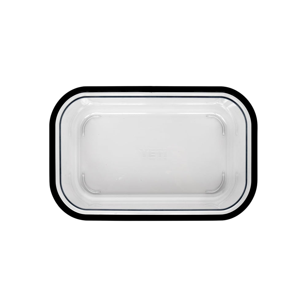 YETI Roadie small basket inside cooler helps secure essentials and prevent sliding.
